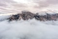 Aerial view with fog of SawtoothÃ¢â¬â¢s rocky mountain peak