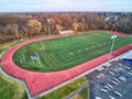 Aerial View of Football Field with Running Track Around the Perimeter