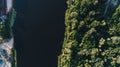 Aerial view of the forest. Canoe. River. Summer. Trees. Royalty Free Stock Photo