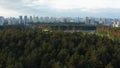 Aerial view of the forest the city and the car interchange Royalty Free Stock Photo