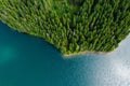 Aerial view of a forest lake. Aerial view of blue lake and green forests on a sunny summer day. Drone photography. Forest and lake Royalty Free Stock Photo