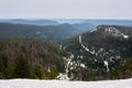 Aerial view of forested mountains in winter Royalty Free Stock Photo