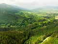 Aerial view of forests and farmlands of Ireland. Beautiful Irish countryside with emerald green fields and meadows Royalty Free Stock Photo