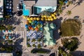 Aerial view of a Fort Lauderdale beach cool off area with gazebos, colorful umbrellas Royalty Free Stock Photo