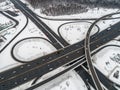Aerial view of a freeway intersection Snow-covered in winter Royalty Free Stock Photo