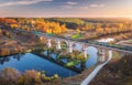 Aerial view of freight train on railroad bridge and river Royalty Free Stock Photo