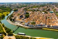 Aerial view of Saintes on Charente river with medieval cathedral, France