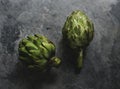 Aerial view of fresh artichokes on black background Royalty Free Stock Photo