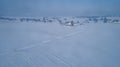 Aerial View of Fresh Followed Morning Snow over an Amish Countryside and Farm Land