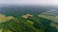 Aerial view of the fresh green forests and fields. Royalty Free Stock Photo