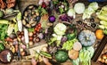 Aerial view of fresh organic various vegetable on wooden table