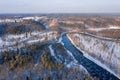 Aerial view of the frozen Gauja river and the famous Turaida castle at sunrise in winter Royalty Free Stock Photo