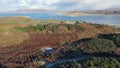 Aerial view of frozen lake in Bonny Glen Woods by Portnoo in County Donegal, Ireland.