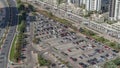 Aerial view full cars at large outdoor parking lots timelapse in Dubai, UAE.