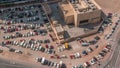 Aerial view full cars at large outdoor parking lots timelapse in Dubai, UAE.