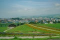 Aerial view of the Furano cityscape with flower blossom below