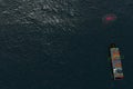 Aerial view of a future autonomous shipping freight navigated by software and quantum computing systems