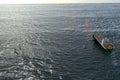 Aerial view of a future autonomous shipping freight navigated by software and quantum computing systems in light mode