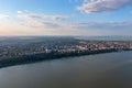 Aerial view of Galati City, Romania. Danube River near city with sunset warm light Royalty Free Stock Photo