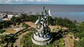 Aerial view of the A giant shark and crocodile statue as a symbol of the city of Surabaya. A landmark or monument as an icon of