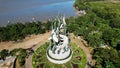 Aerial view of the A giant shark and crocodile statue as a symbol of the city of Surabaya. A landmark or monument as an icon of