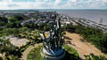 Aerial view of the A giant shark and crocodile statue as a symbol of the city of Surabaya. A landmark or monument as an icon of