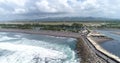 Aerial view of Glagah Beach which is very beautiful with waves and concrete breakwater