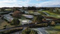 Aerial view of a Gleneagles Golf course, on a sunny day, with trees and hills in the background Royalty Free Stock Photo