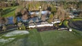 Aerial view of a Gleneagles Golf Course with a hotel surrounded by trees and a lake on a sunny day Royalty Free Stock Photo