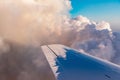 Aerial view of golden clouds lit by the evening sun over Florida, view from the aircraft during the flight. Royalty Free Stock Photo