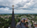 Aerial View of Golden Cross Church Spire and Suburban Landscape Royalty Free Stock Photo