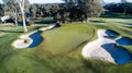 Aerial view of golf course green with flag, bunkers, dams, fairways Sydney Australia Royalty Free Stock Photo