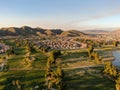 Aerial view of golf course surrounded by town houses and luxury villas during sunset time, Temecula Royalty Free Stock Photo