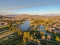 Aerial view of golf course surrounded by town houses and luxury villas during sunset time, Temecula Royalty Free Stock Photo