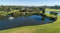 Aerial view of golf course water hazard dam Royalty Free Stock Photo