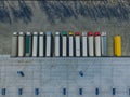 Aerial view of goods warehouse. Logistics center in industrial city zone from above.