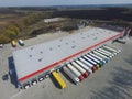 Aerial view of goods warehouse. Logistics center in industrial city zone from above.