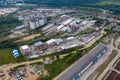 Aerial view of goods warehouse. Logistics center in industrial city zone from above. Yekaterinburg, Russia