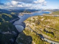 Aerial view of Gordon Dam and lake at sunset. Southwest, Tasmania