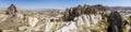 Aerial view of Goreme National Park, Tarihi Milli Parki, Turkey. The typical rock formations of Cappadocia. Tourists on quads Royalty Free Stock Photo
