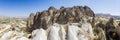 Aerial view of Goreme National Park, Tarihi Milli Parki, Turkey. The typical rock formations of Cappadocia. Tourists on quads Royalty Free Stock Photo