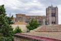 Aerial view of the gothic cathedral of Avila rising above the ancient roofs.