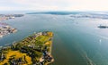 Aerial view of the Governors Island, NY with the Statue of Liberty in the background Royalty Free Stock Photo