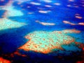 Aerial view Great Barrier Reef from sky out of air plane Royalty Free Stock Photo