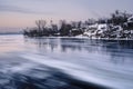 Aerial view of the great river with floating ice floes during the dusk. Drifting of ice. Ice floe. motion blur. II