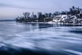 Aerial view of the great river with floating ice floes during the dusk. Drifting of ice. Ice floe. motion blur. III