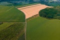 aerial view of green agricultural land with different crops. Royalty Free Stock Photo