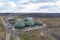 Aerial view of green biogas plant storage tanks