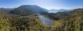 Aerial View of Green Canadian Nature Landscape. Lake around Mountains. Royalty Free Stock Photo