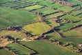 Aerial view of green fields and slopes Royalty Free Stock Photo